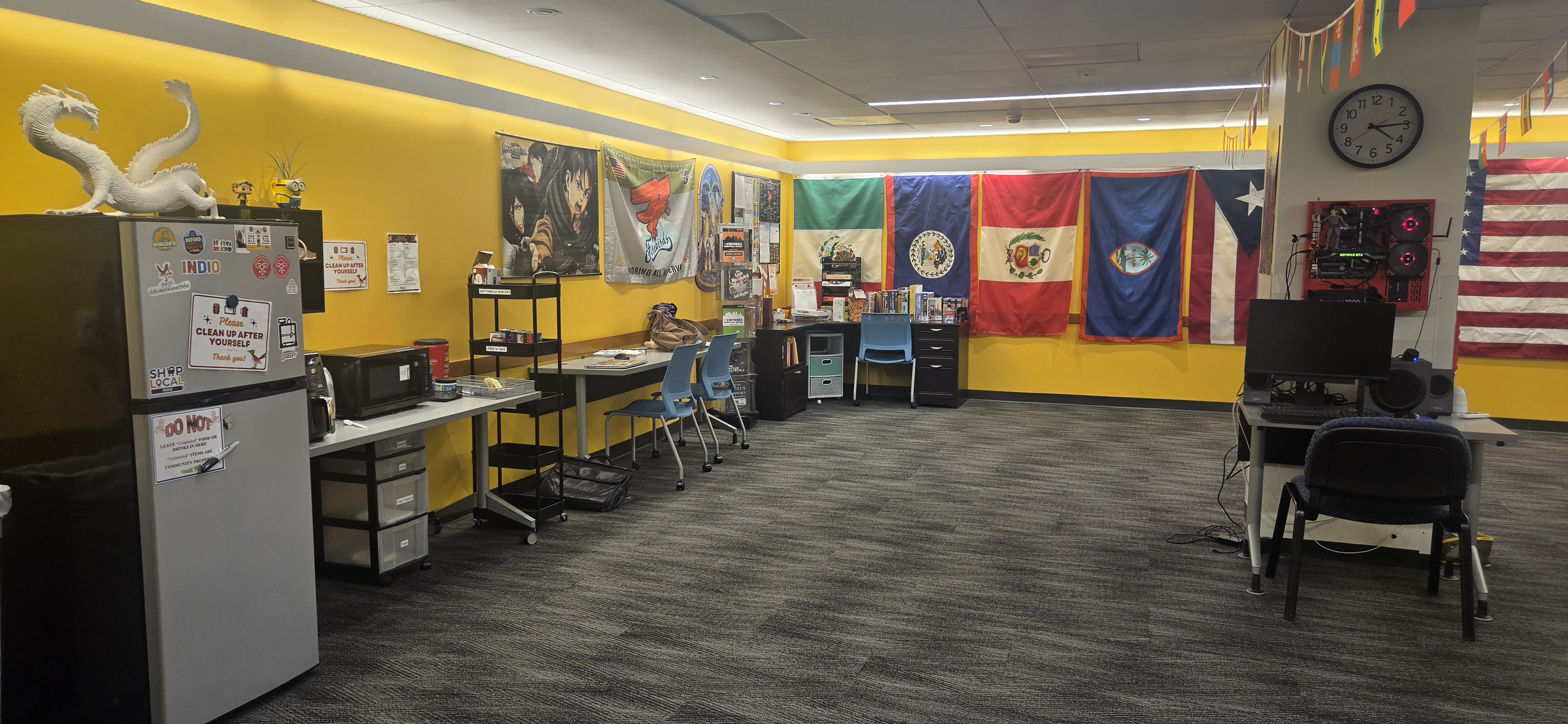Lounge Area with Fridge, Flags, and Workstations